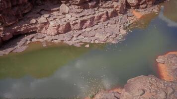 Exploring the calm waters of the Colorado River surrounded by rugged cliffs video