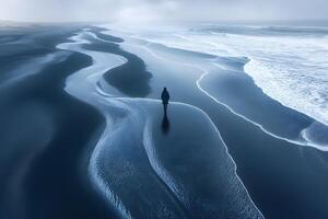 Lonely Walk on Misty Beach at Dawn - Serene Coastal Reflection for Tranquil Designs photo