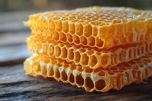 Close-Up of Honeycomb on Rustic Wood Surface for Nature-Themed Designs photo