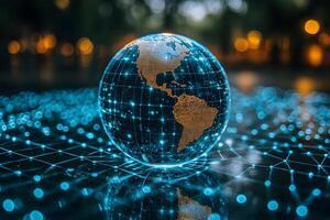 Digital Connectivity Globe with Network Grid Illuminated at Night photo