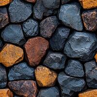 Abstract wall of colorful textured stones in various shapes and sizes photo