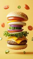 Floating ingredients of a hamburger with vegetables, cheese, and sesame seed bun photo