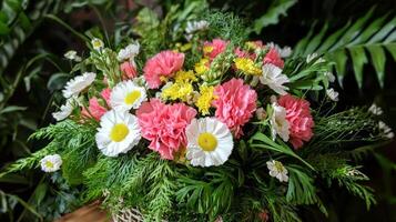 A basket with pink and white flowers photo