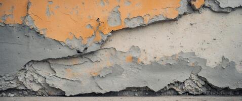 Weathered cement surface with chipped edges and faded color on bright background. photo