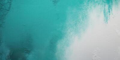 Eye catching grunge effect created by a textured background with a turquoise and white gradient photo