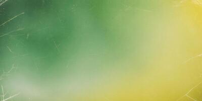 Green and yellow gradient textured background with scratches and dust particles creating vintage design. photo