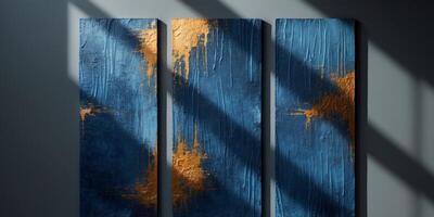 Abstract Expressionism Triptych Textured Panels in Deep Blues and Warm Golds with Dramatic Side Lighting photo