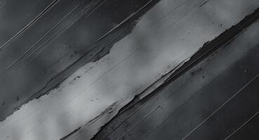 Gray and black abstract textured background with diagonal lines for vintage grunge design and ample copy space for creative text applications. photo