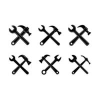 Hammer and Wrench Silhouette and Linocut Design vector