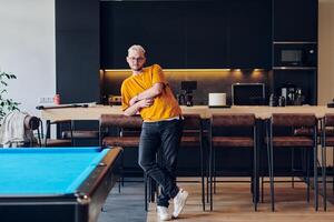 A man takes a brief rest from work in a modern startup coworking center, using the moment to recharge and relax with technology by his side. photo