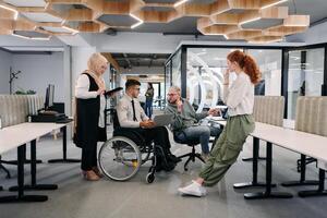 Young group of business people brainstorming together in a startup space, discussing business projects, investments, and solving challenges photo