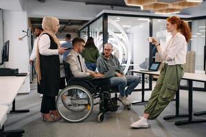 Young group of business people brainstorming together in a startup space, discussing business projects, investments, and solving challenges photo
