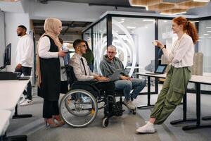 Young group of business people brainstorming together in a startup space, discussing business projects, investments, and solving challenges photo