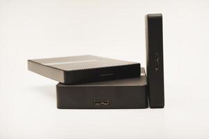 Hard drives.Modern data storage devices with USB wires. photo