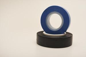Black and blue electrical tape on a white background. photo