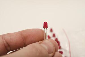 The electronic component. Old LED elements. Red LEDs. photo