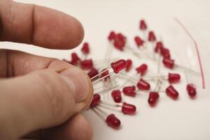 Red LEDs. The electronic component. Old LED elements. photo