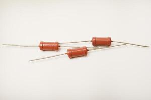 Old resistors. Resistors axial terminals. Elements of electronics. photo