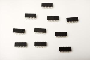 A microcontroller white background. An electronic chip in a plastic case. photo