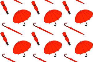 Red Seamless pattern of various umbrellas. Open, folded, and closed umbrellas. Various positions. Parasols for rainy weather. Rain protection accessories. vector
