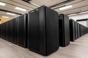 Rows of server racks with green lights in a modern data center during daytime operations photo