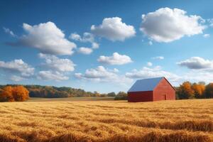 Vibrant autumn landscape showcases a red barn surrounded by golden fields under a blue sky filled with fluffy clouds photo