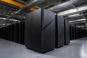 Large server room housing multiple black server racks with advanced technology in a modern data center photo