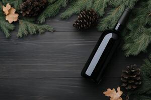 Elegant wine bottle surrounded by pine cones and evergreen branches on dark wooden background photo
