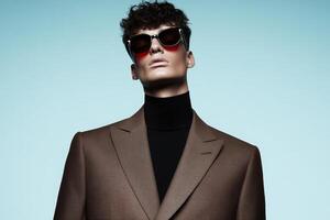 Model showcasing stylish fashion with sunglasses in a modern photoshoot against a minimalist background photo