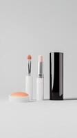 Various makeup products arranged neatly on a plain background showcasing beauty essentials photo