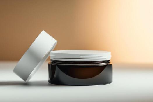 Container with white lid and dark glass body displaying rich texture in soft natural light photo