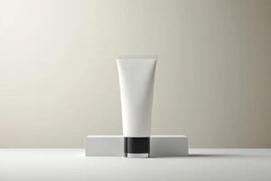 Minimalistic display of a white cosmetic tube on a plain background in a modern setting photo