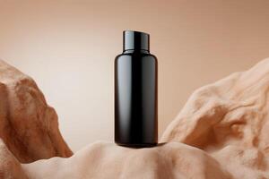 Simple black bottle positioned on textured beige rocks with soft lighting in a minimalistic setting photo
