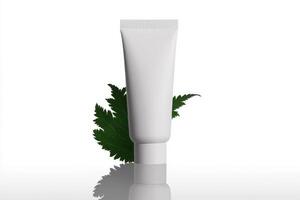 Natural skincare product displayed beside a green leaf on a reflective surface in a minimalist arrangement photo
