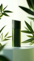 Minimalist green bottle surrounded by lush foliage on a bright surface with soft lighting and a calm atmosphere photo
