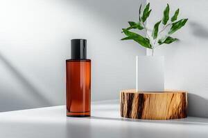 Elegant brown glass bottle next to a plant on a wooden stand in a minimalist setting with soft lighting photo