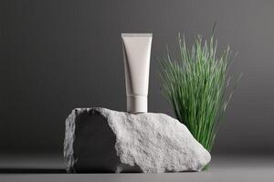 Cream tube displayed on a stone with green grass in a minimalist setting highlighting natural beauty photo