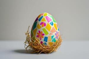 An easter egg with colorful designs on it photo