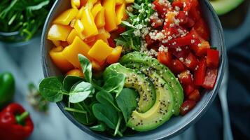 A bowl of vegetables and fruit with quinoa photo