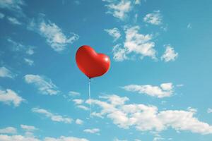 A red heart shaped balloon is floating in the sky photo