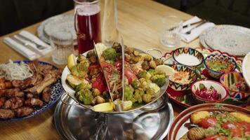 Festive Table with Grilled Meat and Colorful Appetizers video