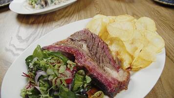 Grilled Beef with Chips and Salad video