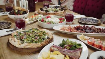 Traditional Feast with Assorted Dishes on Table video