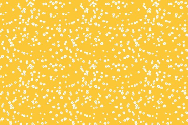 Seamless pattern of tiny white floral dots, small spots, little drops scattered across a yellow background. This playful, minimalist design for print, textiles, gift wrap, wallpapers, stationery
