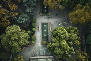 Aerial view of a park with trees and a fountain photo