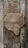 Rustic Burlap Speech Bubble on Wood Grain Background for Organic Handmade Campaigns photo
