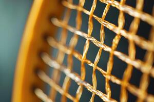 Intricate Badminton Racquet String Pattern Highlighting Design and Tension for Sports Enthusiasts photo