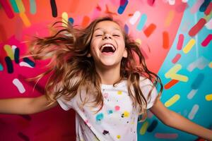 Teenage Girl Expressing Extreme Joy in Colorful Studio Setting photo