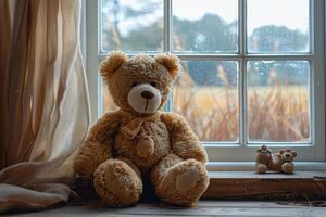 Plush Teddy Bear by a Window Creates a Nostalgic Atmosphere photo