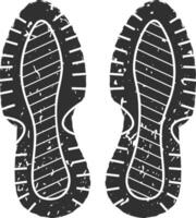 Black and white grunge illustration of a footprint showing the sole pattern of a pair of sports shoes, creating a powerful image of movement and activity vector
